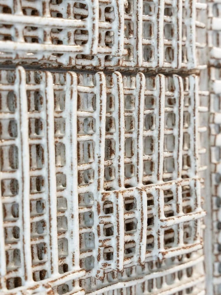 Inspired by the ZERO movement, this series of ceramic bas-reliefs explores reduction and visual .jpg